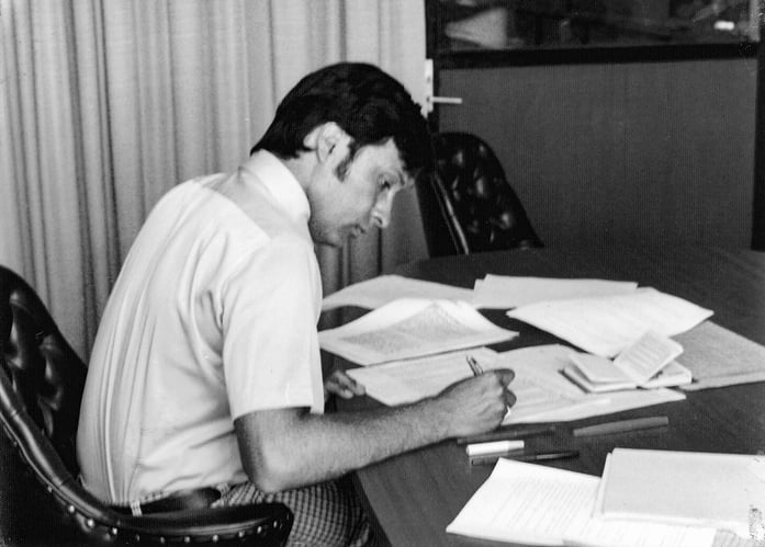 Alberto at his desk.